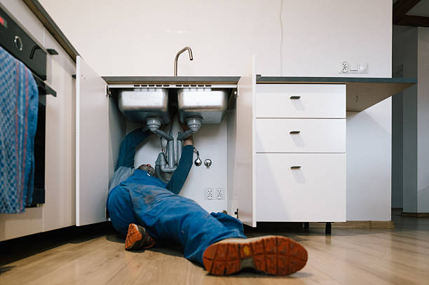 Professional Drain Cleaning technician working in Miller Place, NY
